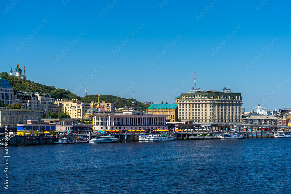 Panoramic view of Podol district and Dnypro river from pedestrian bridge in Kyiv, Ukraine on August 30, 2020. 