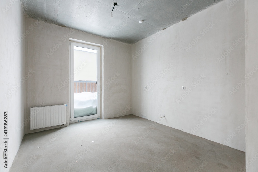 interior of the apartment without decoration in gray colors. rough finish interior of the apartment without decoration in gray colors. rough finish