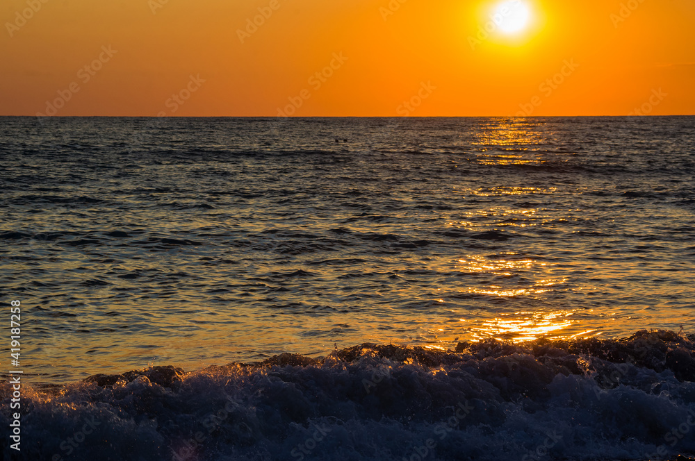 Amazing sea sunset, the sun, waves, clouds Amazing sea sunset, the sun, waves, clouds