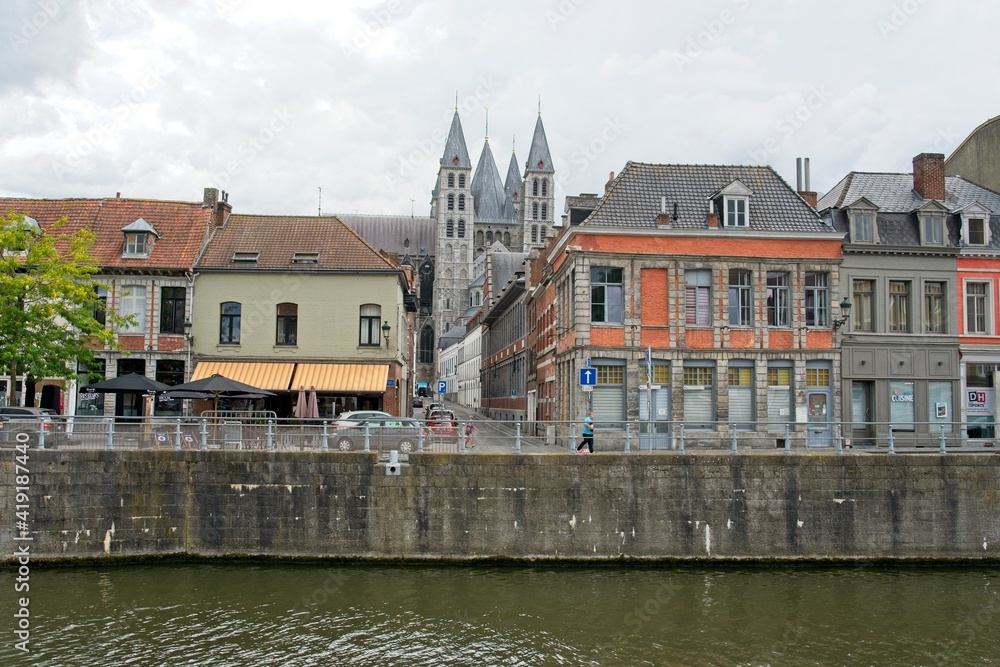 Naklejka premium Tournai Belgium - 3 August 2020 - River Scheldt in downtown Tournai (Doornik) in Belgium