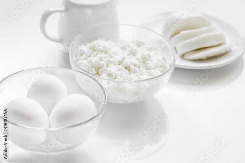 Fresh dairy products on white desk background