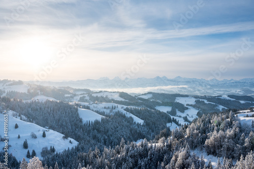 view from Lüderenalp over the hills of Emmental on beautiful winter morning in winter