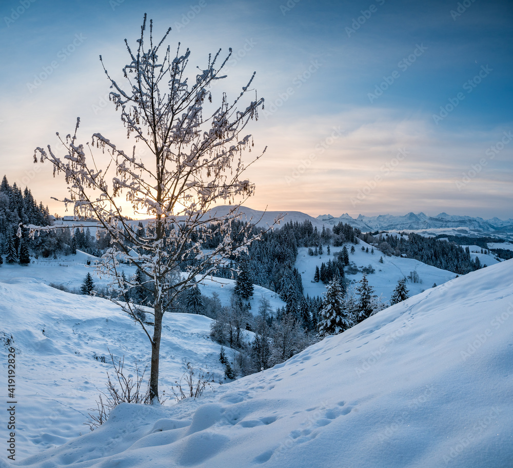 view from Lüderenalp over the hills of Emmental on beautiful winter morning in winter view from Lüderenalp over the hills of Emmental on beautiful winter morning in winter