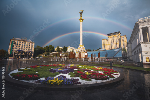Independence Monument Column at Independence Square with a beautiful double rainbow - Kiev, Ukraine photo