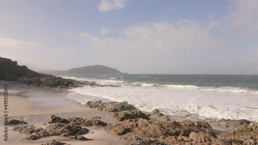 video of the Galician coast with waves and morning light video of the Galician coast with waves and morning light