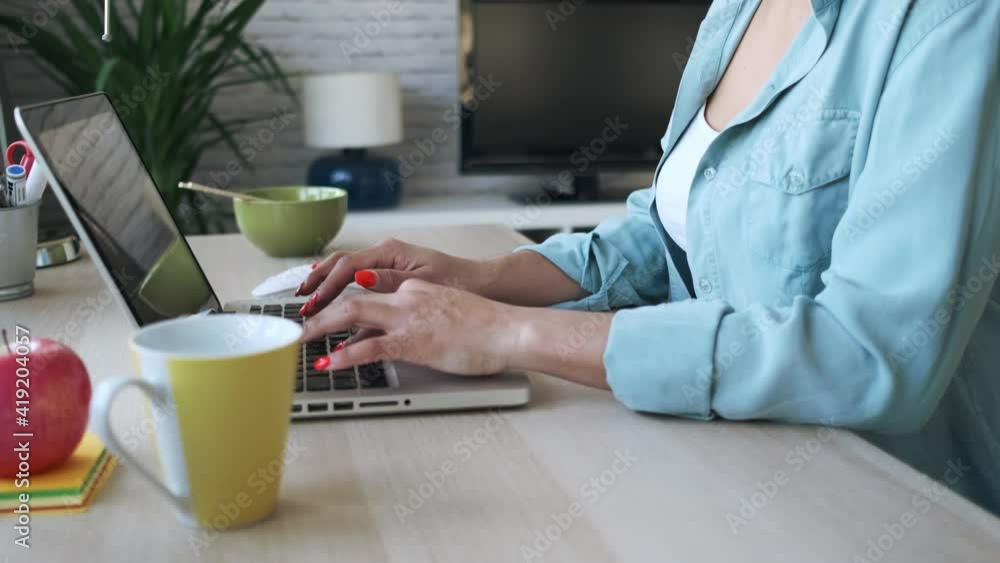 Video of beautiful young afro business woman working with laptop sitting in the office at home. Video of beautiful young afro business woman working with laptop sitting in the office at home.
