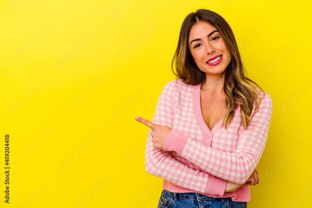 Young caucasian woman isolated on yellow background Young caucasian woman isolated on yellow background