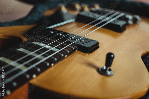 Close up gibson electric guitar, les Paul special model natural finish, P90 pickup.