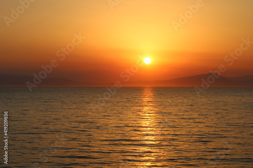 Beautiful Sunset near Cyclades of Aegean Sea in Greece