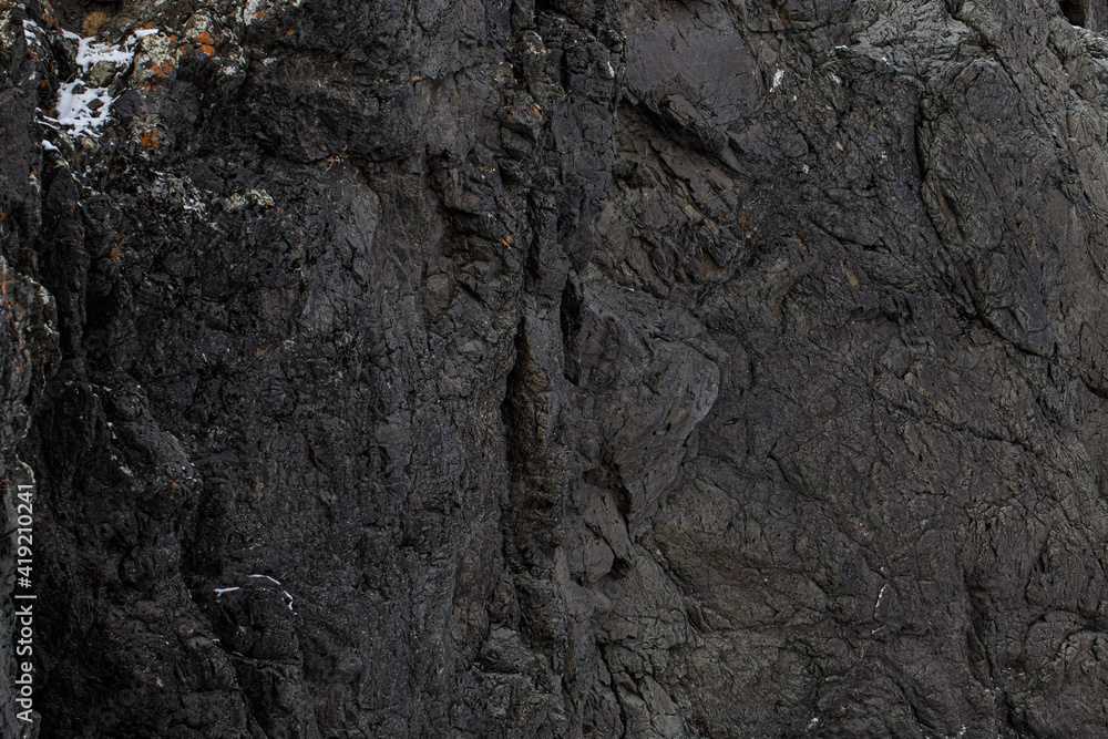 black rock in winter, texture, stone