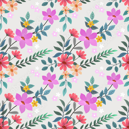 Abstract floral seamless pattern design. Cute hand drawn illustration. Pink and purple small flowers on gray background.
