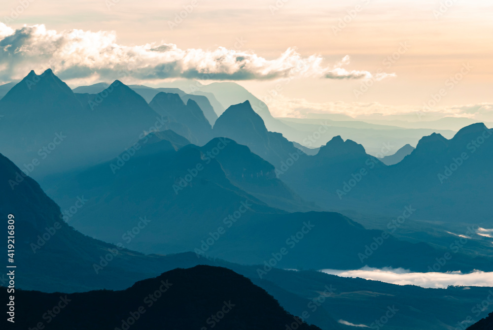 Silhouettes of Santa Catarina mountains at sunrise, seen from the funnel´s canyon