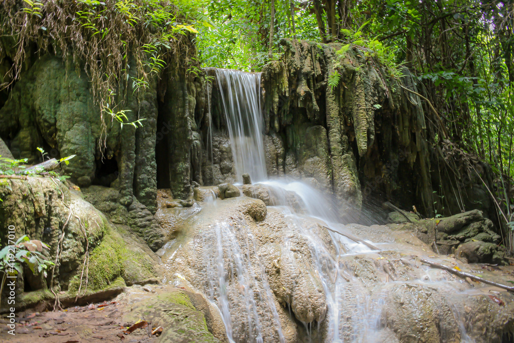 Natural waterfall in the forest, Erawan waterfall, Kanchanaburi Province, Thailand.