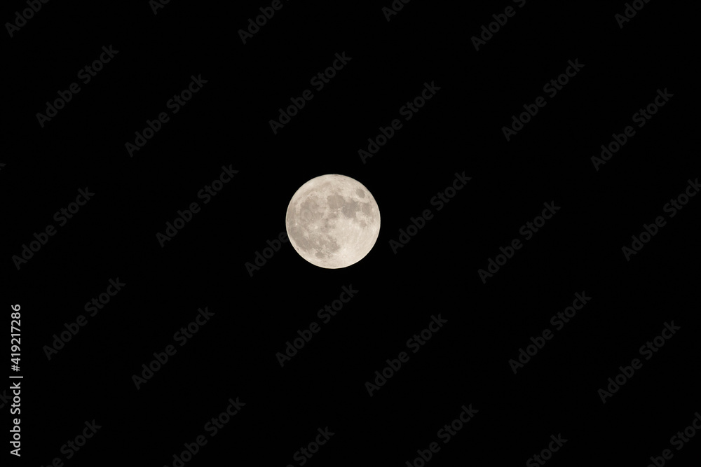 Glowing Moon Against Dark Sky Glowing Moon Against Dark Sky