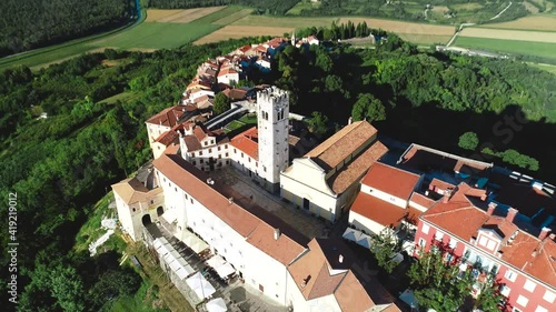 Motovun. Aerial view of idyllic hill town of Motovun surrounded by defense stone walls and Mirna river valley. Istria region of Croatia