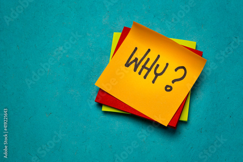 why question on a sticky note, asking for a reason or explanation photo