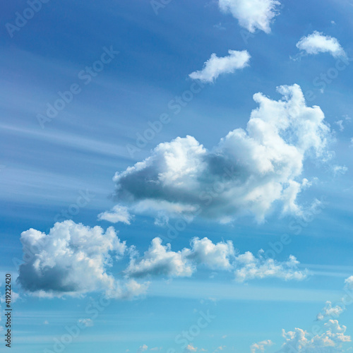 Beautiful blue sky with white clouds as a natural background.