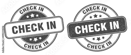 check in stamp. check in label. round grunge sign