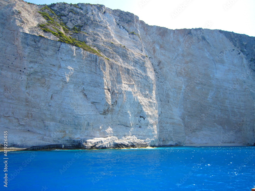Excursion around the island of Zakynthos on a pleasure boat. Rocky shores of white limestone. White sand beaches. Greece
