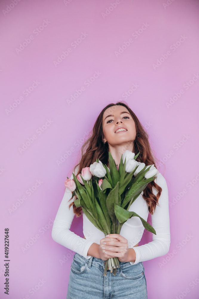 Happy woman holding tulips flowers isolated portrait girl in casual clothes