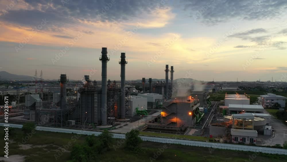 Aerial view Industrial power plant and refinery and oil tank at dusk. Business and petrochemical plants, oil storage tanks and for energy and steel pipes in Twilight time
Aerial view Industrial power plant and refinery and oil tank at dusk. Business and petrochemical plants, oil storage tanks and for energy and steel pipes in Twilight time
