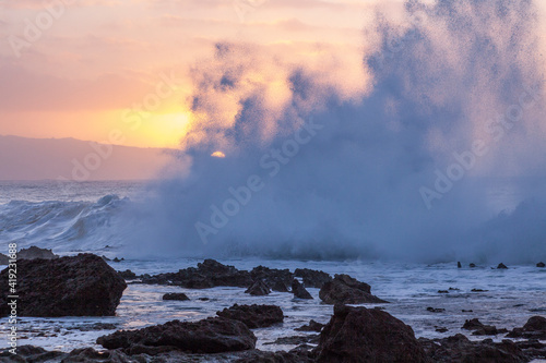 USA, Hawaii, Oahu, North Shore and waves crashing ashore right at sunset