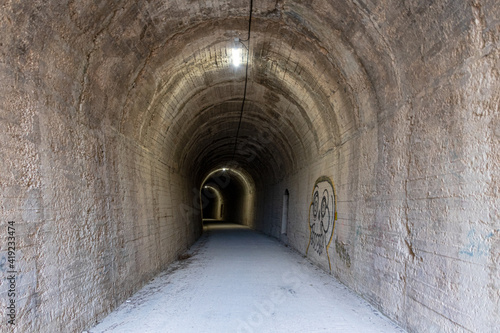 Tunnel of an old train track  nowadays converted into a greenway  in Alcoy  Alicante  Spain .