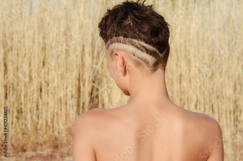 one young girl with an undercut haircut photo