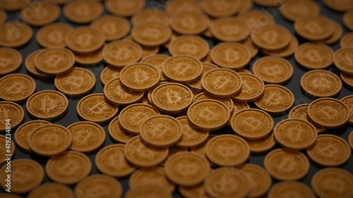 Stack of bitcoins background wallpaper with dof focus