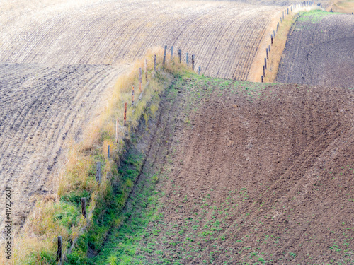 USA, Idaho, fence line and rolling hills near Cottonwood Highway 95 photo