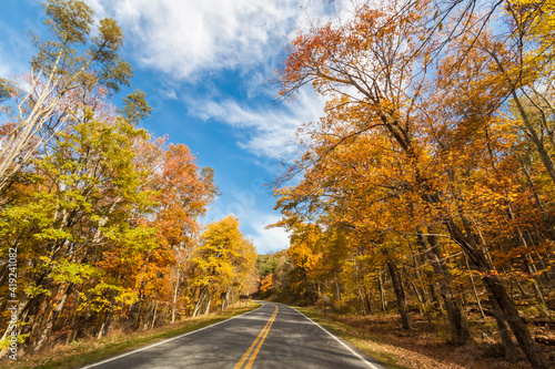 colorful autumn foliage and open road in Skyline drive in Shenandoah National Park in Virginia.