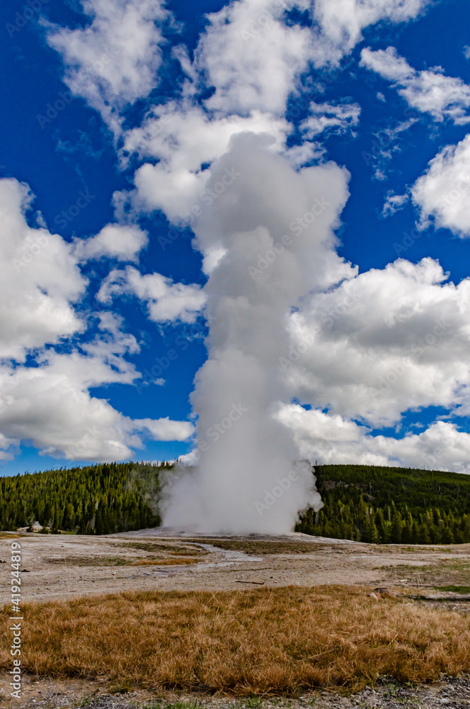 Geyser Old Faithful erupts in Yellowstone National Park in Wyoming, US Geyser Old Faithful erupts in Yellowstone National Park in Wyoming, US