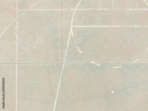 aerial drone view of the lines painted on the floor of a sports center