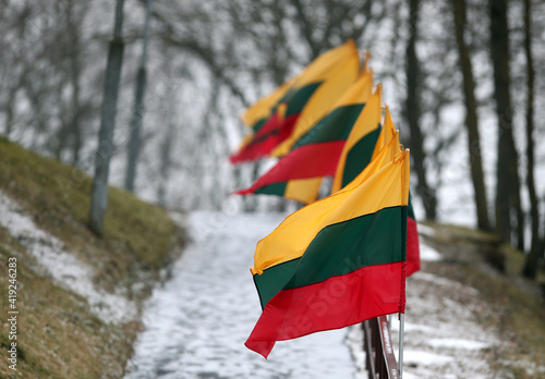 Lithuanian state flag, next to the footpath. Kedainiai photo