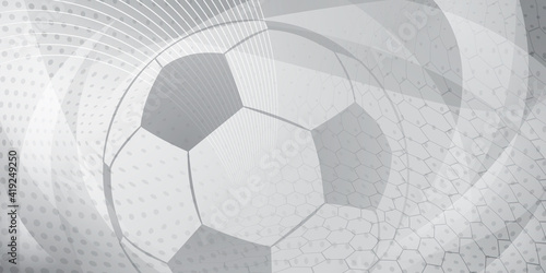 Football or soccer background with big ball in gray colors