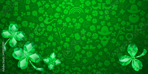 Background on St. Patrick's Day made of crystal clover leaves and other symbols in green colors