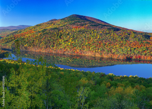Landscape of Traveler Mountain and South Branch Pond, fall foliage, Baxter State Park, Maine, USA.