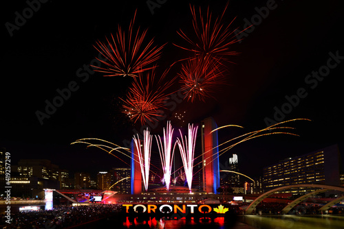 TORONTO, CANADA -JULY 1, 2017: Canada Day 2017 Fireworks set off from Toronto City Hall at Nathan Philips Square.