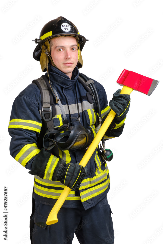 Portrait of young brave man in uniform and hard hat of fireman holds axe and looking at camera with smile isolated on white background Portrait of young brave man in uniform and hard hat of fireman holds axe and looking at camera with smile isolated on white background