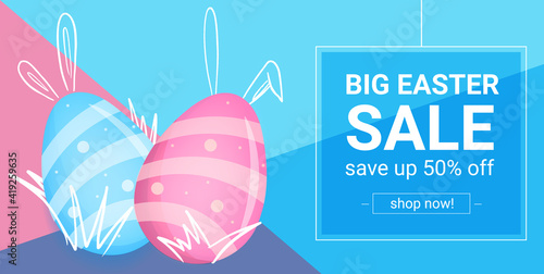 Banner Big easter sale. Save up 50 percentages off. Colorful pink and blue egg with bunny ears.