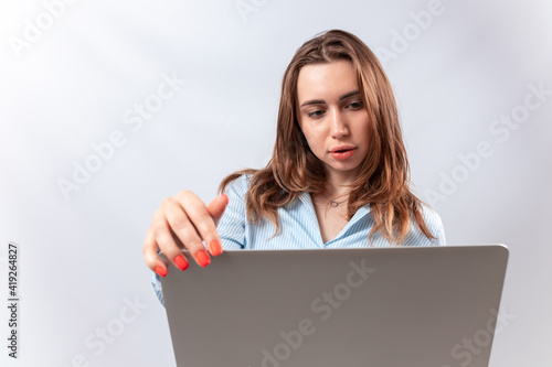 smiling businesswoman hold laptop in her hands. isolated