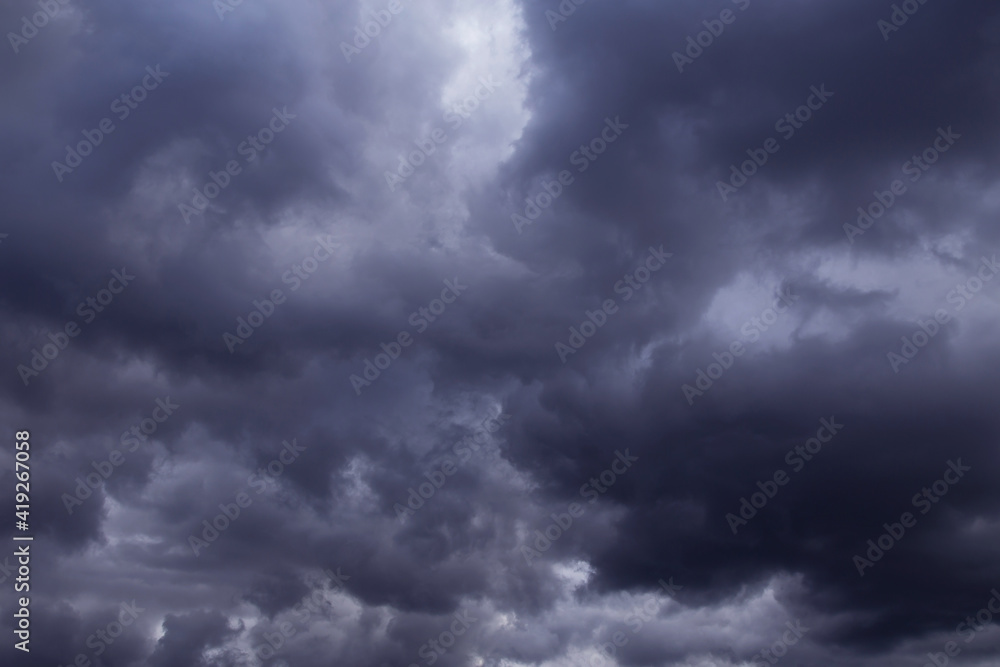 Storm sky with dark cumulus clouds background texture, thunderstorm	

