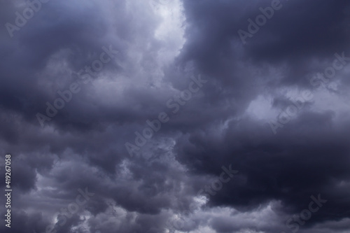 Storm sky with dark cumulus clouds background texture, thunderstorm 