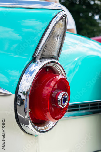 Classic car closeup of turquoise fin and tail light