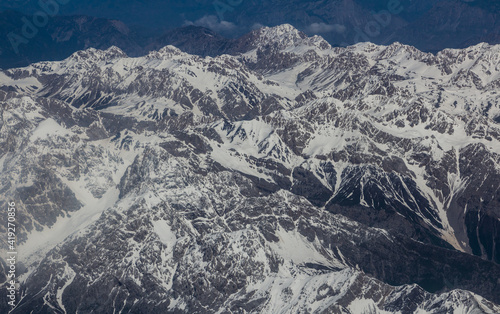 Aerial view of snow covered Tian Shan mountains in Kyrgyzstan