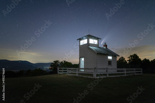 Comet Neowise setting over a historic Virginian fire watchtower overlooking Shenandoah National Park during the Summer of 2020.