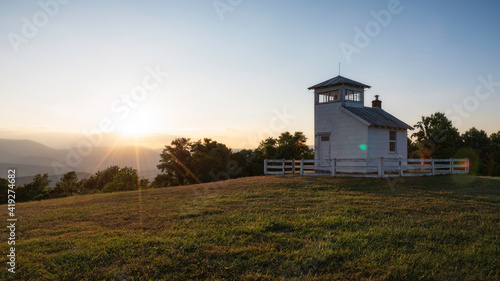 Clear skies at sunset viewed from a historic fire watchtower within the foothills of Shenandoah National Park.