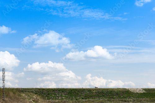 Fototapeta Naklejka Na Ścianę i Meble -  clouds over the field