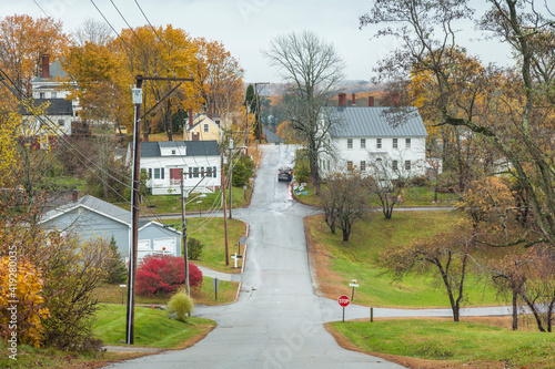 USA, Maine, Wiscasset. Village road during autumn. photo