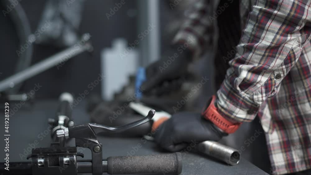 Ecofriendly electric vehicle repair service. Caucasian male electric